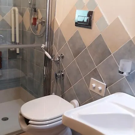Domo - Guest-house Il Nespolo Fiorito Oda ve Kahvaltı Orosei