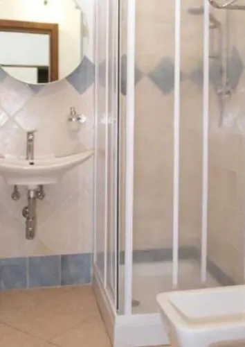 Domo - Guest-house Il Nespolo Fiorito Panzió 3*
