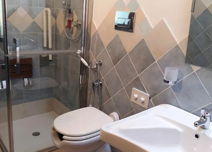 Domo - Guest-house Il Nespolo Fiorito Panzió Orosei